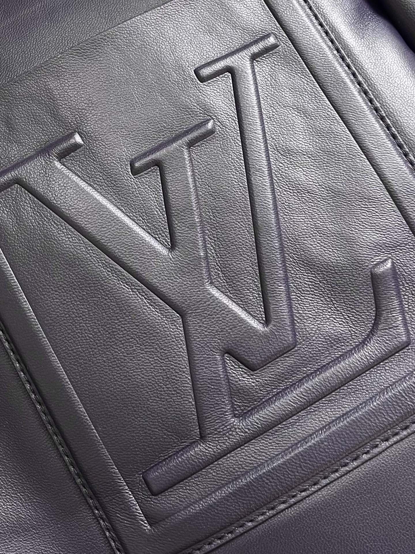 Lv 3D detail leather belted jacket