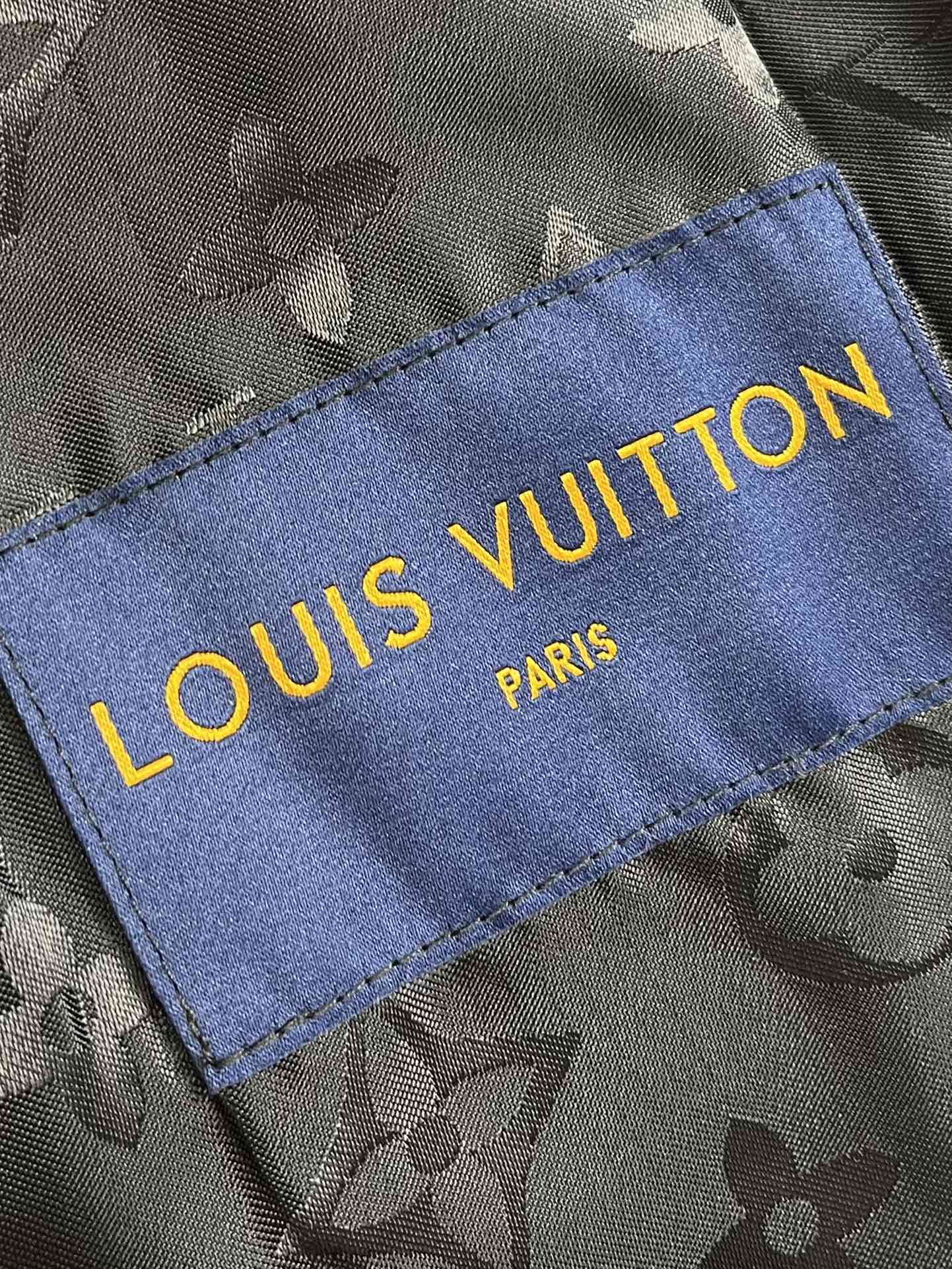 Lv 3D detail leather belted jacket